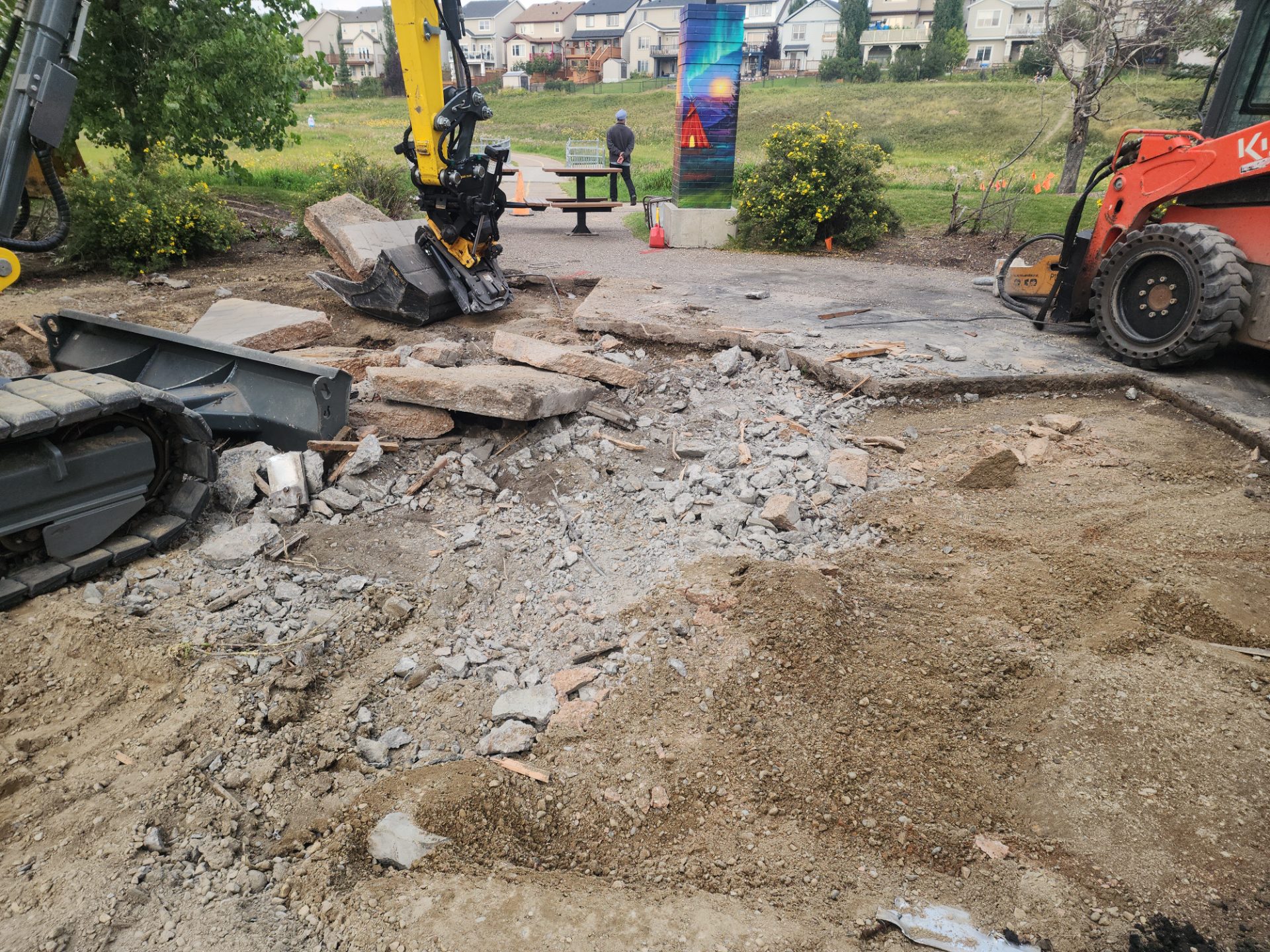 Walkway removal in progress on a residential path